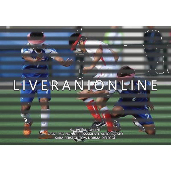 (101216) -- GUANGZHOU, Dec. 16, 2010 () -- China\'s Yu Yutan (C) is tackled by Kittikorn Baodee (R) of Thailand during the men\'s football 5-a-side preliminary match between China and Thailand at the 2010 Asian Para Games in Guangzhou, capital city of south China\'s Guangdong Province, Dec. 16, 2010. China won 5-0. (/Nie Jianjiang) (zc) AG. ALDO LIVERANI SAS ITALY ONLY