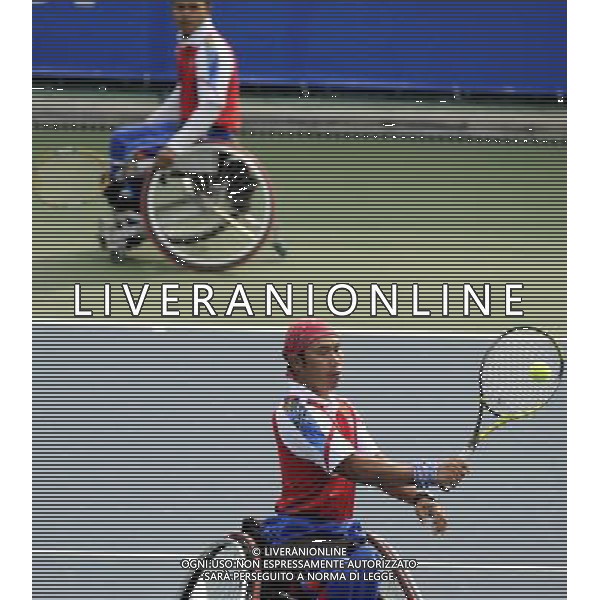 (101216) -- GUANGZHOU, Dec. 16, 2010 () -- Suthi Khlongrua and Sumrerng Kruamai (front) of Thailand compete with Cheng Han Tsung and Tai Chia Yang of Chinese Taipei during the quarterfinal of the men\'s wheelchair tennis doubles at the 2010 Asian Para Games in Guangzhou, capital city of south China\'s Guangdong Province, Dec. 16, 2010. The Thai pair won 2-0 and advanced into the semifinal. (/Yue Yuewei) (zc) AG. ALDO LIVERANI SAS ITALY ONLY