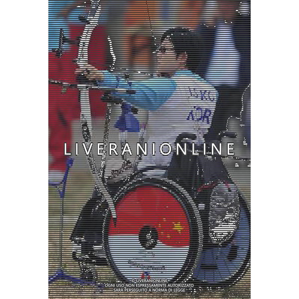 (101213) -- GUANGZHOU, Dec. 13, 2010 () -- Ko Hee Sook of South Korea competes during the women\'s team recurve open ranking round at the Guangzhou 2010 Asian Para Games in Guangzhou, south China\'s Guangdong Province, Dec. 13, 2010. South Korea broke the world record with 1181 points. (/Chen Yehua) AG. ALDO LIVERANI SAS ITALY ONLY