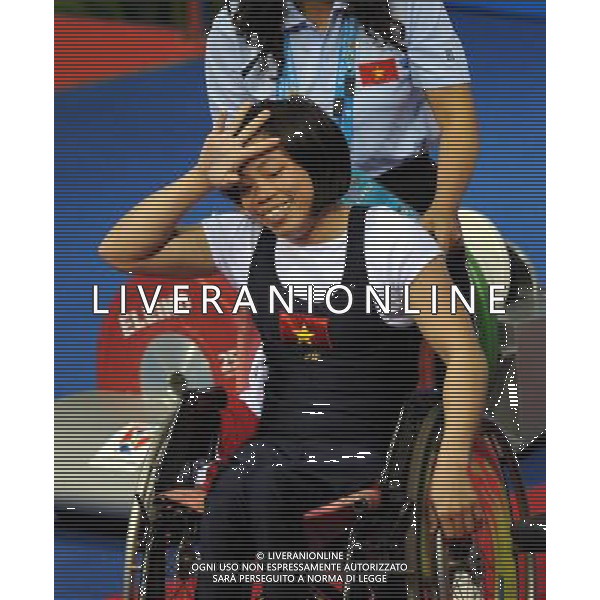 (101213) -- GUANGZHOU, Dec. 13, 2010 () -- Nguyen Thi Hong of Vietnam reacts after winning bronze in the women\'s powerlifting -40kg event at the Guangzhou 2010 Asian Para Games in Guangzhou, south China\'s Guangdong Province, Dec. 13, 2010. (/Fan Changguo) AG. ALDO LIVERANI SAS ITALY ONLY