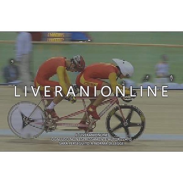(101213) -- GUANGZHOU, Dec. 13, 2010 () -- Bao Lifeng (L) and Sun Jiajia of China compete during the final of mixed tandem 4km ind pursuit of cycling track competition at the Guangzhou 2010 Asian Para Games in Guangzhou, south China\'s Guangdong Province, on Dec. 13, 2010. Bao Lifeng and Sun Jiajia won the bronze. (/Lu Hanxin) AG. ALDO LIVERANI SAS ITALY ONLY