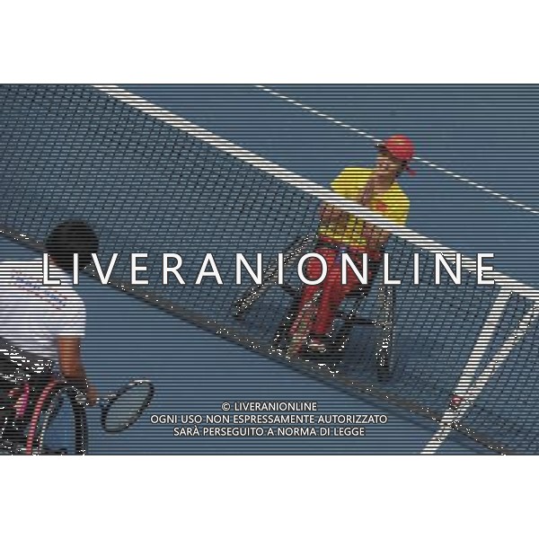 (101213) -- GUANGZHOU, Dec. 13, 2010 () -- Huang Jinlian (R) of China greets Ratana Techamaneewat of Thailand after the 1st round of women\'s singles open of wheelchair tennis at the Guangzhou 2010 Asian Para Games in Guangzhou, south China\'s Guangdong Province, on Dec. 13, 2010. Huang Jinlian won 2-0. (/Yue Yuewei) AG. ALDO LIVERANI SAS ITALY ONLY