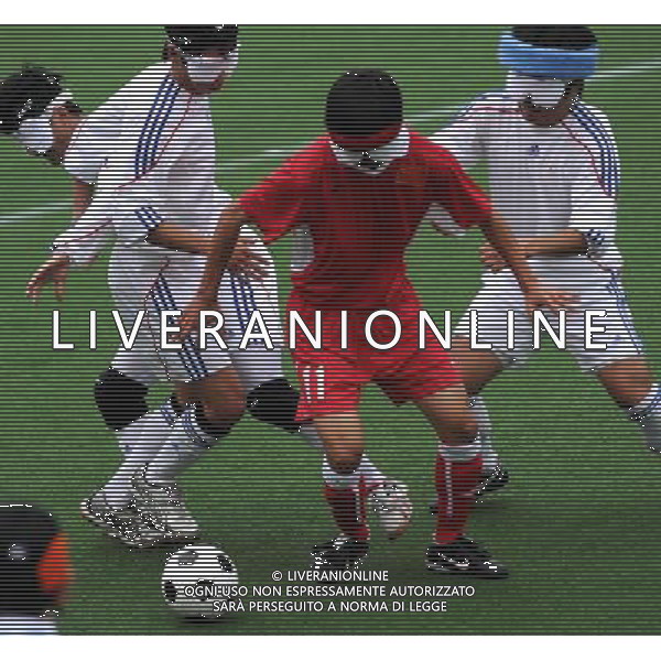 (101213) -- GUANGZHOU, Dec. 13, 2010 () -- Wang Yafeng (2nd R) of China competes during the preliminary of men\'s football 5-a-side competition against Japan at the Guangzhou 2010 Asian Para Games in Guangzhou, south China\'s Guangdong Province, on Dec. 13, 2010. China won 3-0. (/Nie Jianjiang) AG. ALDO LIVERANI SAS ITALY ONLY