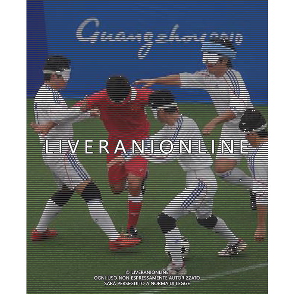 (101213) -- GUANGZHOU, Dec. 13, 2010 () -- Li Xiaoqiang (2nd L) of China competes during the preliminary of men\'s football 5-a-side competition against Japan at the Guangzhou 2010 Asian Para Games in Guangzhou, south China\'s Guangdong Province, on Dec. 13, 2010. China won 3-0. (/Wang Song) AG. ALDO LIVERANI SAS ITALY ONLY