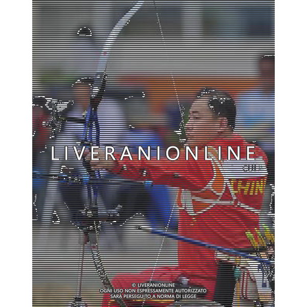 (101213) -- GUANGZHOU, Dec. 13, 2010 () -- Cui Jihai of China competes during the ranking round of men\'s individual recurve-W1/W2 of archery competition at the Guangzhou 2010 Asian Para Games in Guangzhou, south China\'s Guangdong Province, on Dec. 13, 2010. (/Chen Yehua) AG. ALDO LIVERANI SAS ITALY ONLY