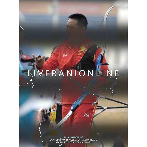 (101213) -- GUANGZHOU, Dec. 13, 2010 () -- Dong Zhi of China reacts during the ranking round of men\'s individual recurve-standing of archery competition at the Guangzhou 2010 Asian Para Games in Guangzhou, south China\'s Guangdong Province, on Dec. 13, 2010. Dong Zhi broke the world record with 649 rings. (/Ren Junchuan) AG. ALDO LIVERANI SAS ITALY ONLY