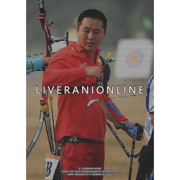 (101213) -- GUANGZHOU, Dec. 13, 2010 () -- Dong Zhi of China competes during the ranking round of men\'s individual recurve-standing of archery competition at the Guangzhou 2010 Asian Para Games in Guangzhou, south China\'s Guangdong Province, on Dec. 13, 2010. Dong Zhi broke the world record with 649 rings. (/Ren Junchuan) AG. ALDO LIVERANI SAS ITALY ONLY
