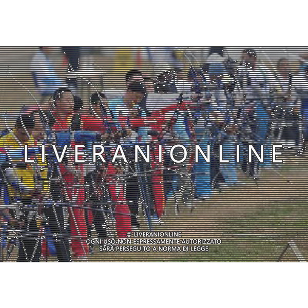 (101213) -- GUANGZHOU, Dec. 13, 2010 () -- Dong Zhi (4th L) of China competes during the ranking round of men\'s individual recurve-standing of archery competition at the Guangzhou 2010 Asian Para Games in Guangzhou, south China\'s Guangdong Province, on Dec. 13, 2010. Dong Zhi broke the world record with 649 rings. (/Ren Junchuan) AG. ALDO LIVERANI SAS ITALY ONLY
