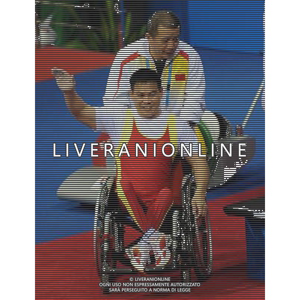 (101213) -- GUANGZHOU, Dec. 13, 2010 () -- Wang Jian of China greets the audience after the men\'s 52kg final of powerlifting competition at the Guangzhou 2010 Asian Para Games in Guangzhou, south China\'s Guangdong Province, on Dec. 13, 2010. Wang Jian won the bronze medal with 162.5 kg. (/Fan Changguo) AG. ALDO LIVERANI SAS ITALY ONLY
