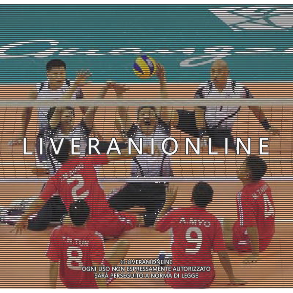 (101213) -- GUANGZHOU, Dec. 13, 2010 () -- Shin Young Joo (C) of South Korea competes during the preliminary pool B match of men\'s volleyball (sitting) against Myanmar at the Guangzhou 2010 Asian Para Games in Guangzhou, south China\'s Guangdong Province, on Dec. 13, 2010. South Korea won 3-0. (/Jiang Hongjing) AG. ALDO LIVERANI SAS ITALY ONLY
