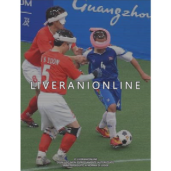 (101213) -- GUANGZHOU, Dec. 13, 2010 () -- Sima Jakhue (R) of Thailand competes during the preliminary of men\'s football 5-a-side against South Korea at the Guangzhou 2010 Asian Para Games in Guangzhou, south China\'s Guangdong Province, on Dec. 13, 2010. Thailand lost 2-3. (/Wang Song) AG. ALDO LIVERANI SAS ITALY ONLY