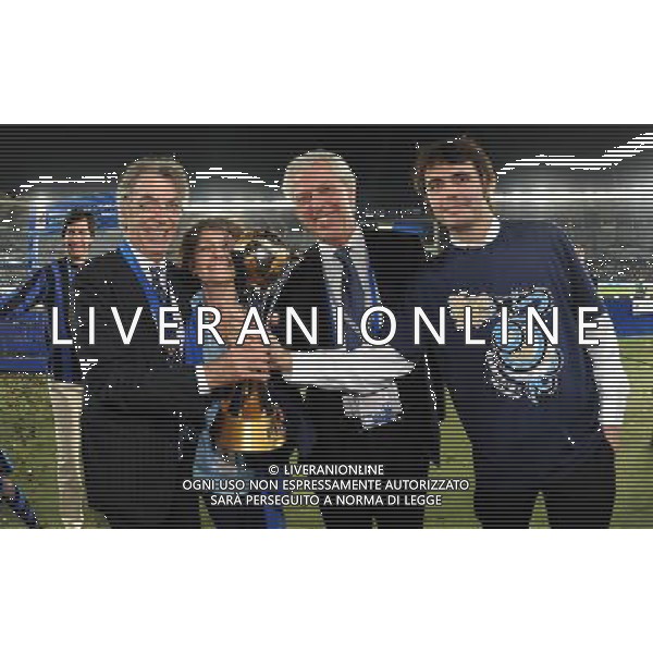 FIFA Club World Cup UAE 2010 Finale 1¡-2¡ Posto Abu Dhabi (Emirati Arabi) Zayed Sports City - 18.12.2010 TP Mazembe Englebert-FC Inter Nella Foto:Massimo Moratti-Emila Bossi-Tronchetti Provera-Giovanni Moratti con la coppa intercontinentale /Ph.Vitez-Ag. Aldo Liverani