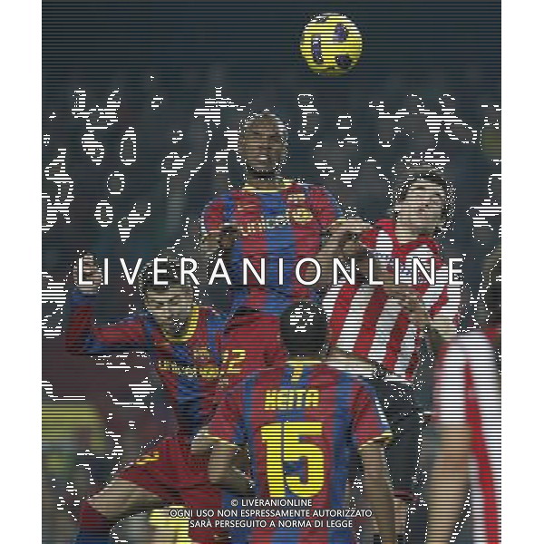 FC Barcelona\'s Eric Abidal (l) and Atletic de Bilbao\'s Javi Martinez during King\'s Cup of Spain match.December 21,2010. (ALTERPHOTOS/Acero) - ALFAQUI - AG. ALDO LIVERANI SAS ITALY ONLY PARTITA CALCIO BARCELLONA vs ATLETICO DI BILBAO: COPPA DEL RE SPAGNA 2010