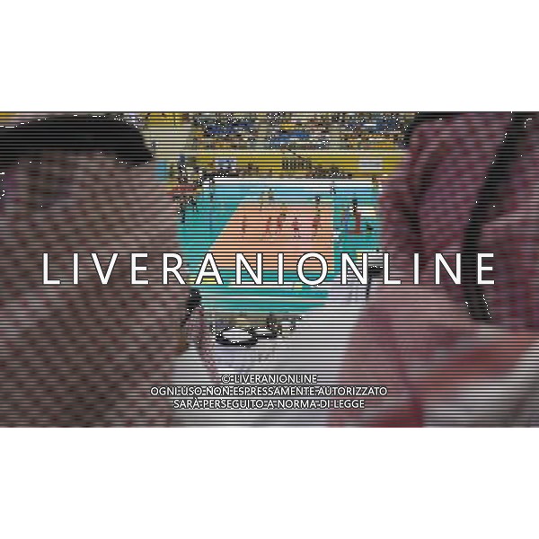 (101222) -- DOHA, Dec. 22, 2010 () -- The audience watch the game during the final at the 2010 FIVB men\'s club world championships between Trentino BetClic of Italy and PGE Skra Belchatow of Poland in Doha, capital of Qatar, Dec. 21, 2010. Trentino BetClic won 3-1 to claim the champion. (/Chen Shaojin) ©photoshot/Agenzia Aldo Liverani Sas - ITALY ONLY - Trentino BetClic (Italia) - PGE Skra Belchatow (Polonia) finale maschile campionati mondiale per club 2010 FIVB a Doha, capitale del Qatar, 21 dicembre 2010. Trentino BetClic e\' campione ha vinto 3-1.