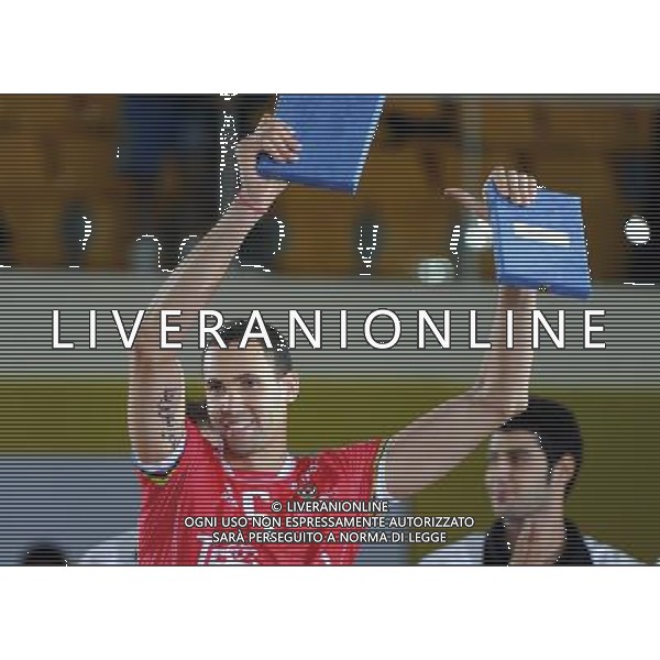 (101222) -- DOHA, Dec. 22, 2010 () -- Osmany Juantorena of Trentino BetClic of Italy reacts with his MVP and Best Spiker individual awards during the awarding ceremony of the final at the 2010 FIVB men\'s club world championships against PGE Skra Belchatow of Poland in Doha, capital of Qatar, Dec. 21, 2010. Trentino BetClic won 3-1 to claim the champion. (/Chen Shaojin) ©photoshot/Agenzia Aldo Liverani Sas - ITALY ONLY - Trentino BetClic (Italia) - PGE Skra Belchatow (Polonia) finale maschile campionati mondiale per club 2010 FIVB a Doha, capitale del Qatar, 21 dicembre 2010. Trentino BetClic e\' campione ha vinto 3-1.