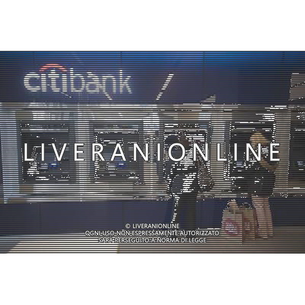 ATM machines in the Citibank new flagship high tech branch in the Union Square neighborhood of New York on Thursday, December 16, 2010. The 9,700 square foot branch is on the site of the closed Virgin Music Megastore and is open seven days offering interactive sales walls and enhanced image ATM\'s. (© Richard B. Levine) AG. ALDO LIVERANI SAS ITALY ONLY