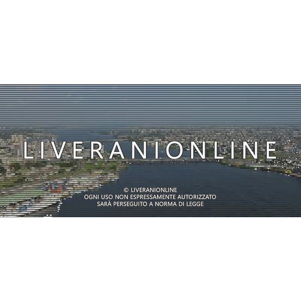 (101230) -- ABIDJAN, Dec. 30, 2010 () -- The photo taken on Dec. 27, 2010 shows a bird\'s eye view of Abidjan, the economic capital of Cote d\'Ivoire. Since the presidential run-off on Nov. 28, Cote d\'Ivoire has been in political gridlock with both Laurent Gbagbo and Alassane Ouattara sworn in as president. (/Zhao Yingquan) (wjd) ©photoshot/Agenzia Aldo Liverani Sas - ITALY ONLY - Veduta panoramica aerea di Abidjan, la capitale economica della Costa d\'Avorio 30/12/2010