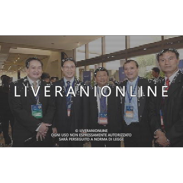 (110106) -- DOHA, Jan. 6, 2011 () -- Vice President of Chinese Football Association (CFA) Lin Xiaohua (2nd L) poses with other representatives at the Sheraton Hotel in Doha, Qatar, Jan. 6, 2011. The 24th Asian Football Confederation (AFC) Congress 2011 was held here Thursday. (/Chen Shaojin) (hy) ©photoshot/Agenzia Aldo Liverani Sas - ITALY ONLY - 24mo congresso dell\'Asian Football Confederation (AFC) a Doha, capitale del Qatar, 6 gennaio 2011.