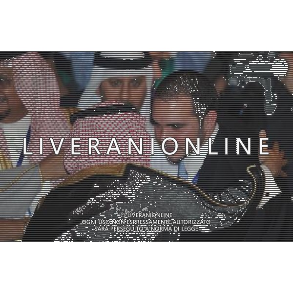 (110106) -- DOHA, Jan. 06, 2011 () -- Jordan\'s Prince Ali bin al-Hussein (R) is congratulated for winning the votes of the Asian Football Confederation (AFC) for the FIFA vice-presidency during the 24th AFC congress in Doha, capital of Qatar, Jan. 6, 2011. (/Chen Shaojin) ©photoshot/Agenzia Aldo Liverani Sas - ITALY ONLY - 24mo congresso dell\'Asian Football Confederation (AFC) a Doha, capitale del Qatar, 6 gennaio 2011.