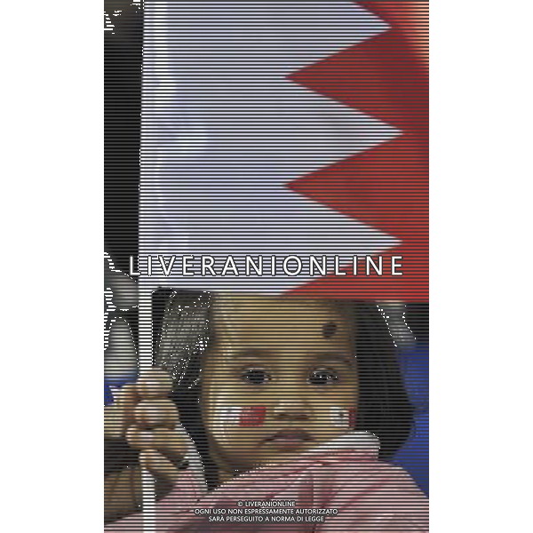 (110111) -- DOHA, Jan. 11, 2011 () -- A little girl waits for the 2011 Asian Cup Group C soccer match between South Korea and Bahrain at Al Gharafa stadium in Doha, capital of Qatar, Jan. 10, 2011. South Korea won by 2-1. (/Tao Xiyi) COPPA D\' ASIA 2011 GRUPPO C COREA DEL SUD VS BAHRAIN AG. ALDO LIVERANI SAS ITALY ONLY *** Local Caption ***