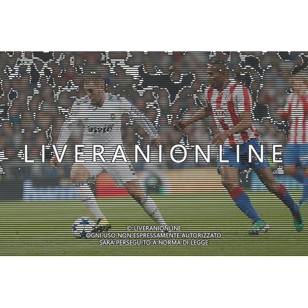 Atletico de Madrid\'s Luis Amaranto Perea and Real Madrid\'s Karim Benzema during spanish cup match on January 13th 2011. Photo: Cesar Cebolla / ALFAQUI AG ALDO LIVERANI ONLY ITALY