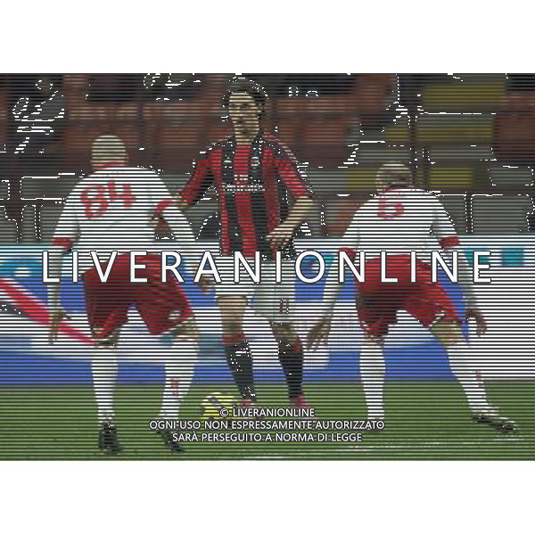 Milano 20-01-2011 Coppa Italia Tim Cup 2010/11 milan-bari nella foto zlatan ibrahimovic, andrea masiello e andrea raggi ph marco luzzani/ag aldo liverani s.a.s.