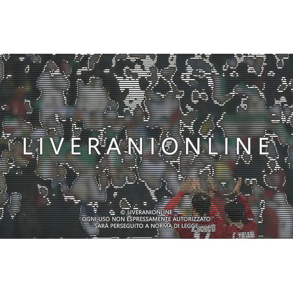 (110115) -- DOHA, Jan. 19, 2011 () -- Iranian players wave to the fans after the Asian Cup group D soccer match against the United Arab Emirates (UAE) in Doha, capital of Qatar, Jan. 19, 2011. Iran beat UAE 3-0. (/Tao Xiyi) (wjd) COPPA D\'ASIA 2011 GRUPPO D IRAN VS EMIRATI ARABI UNITI AG. ALDO LIVERANI SAS ITALY ONLY