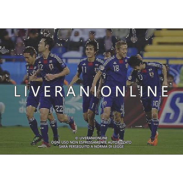 (110121) -- DOHA, Jan. 21, 2011 () -- Shinji Kagawa (1st R) of Japan celebrates his goal with teammates during the 2011 Asian Cup quarter-final football match against Qatar in Doha, capital of Qatar, Jan. 21, 2011. (/Tao Xiyi) /PHOTOSHOT/AG ALDO LIVERANI SAS - ASIAN CUP 2011 ITALY ONLY