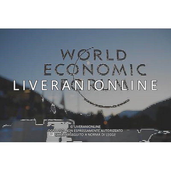 DAVOS/SWITZERLAND, 23JAN11 - The WEF logo is seen on a window at the congress center during preparations for the upcoming Annual Meeting 2011 of the World Economic Forum in Davos, Switzerland, January 23, 2011. World Economic Forum Davos , Svizzera , i preparativi all\'interno della struttura che ospitera\' il meeting annuale , 2011 , del World Economic Forum. AG. ALDO LIVERANI SAS ITALY ONLY