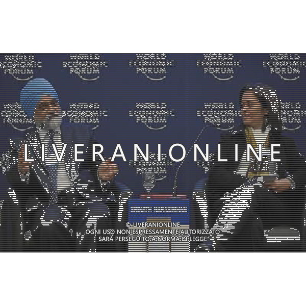 DAVOS/SWITZERLAND, 26JAN11 - Montek Singh Ahluwalia(L), Deputy Chairman, Planning Commission, India and Ingrid Srinath Narasimhan, Secretary-General and Chief Executive Officer, Civicus: World Alliance for Citizen Participation, South Africa captured during the session \'Insights on India\' at the Annual Meeting 2011 of the World Economic Forum in Davos, Switzerland, January 26, 2011. World Economic Forum AG. ALDO LIVERANI SAS ITALY ONLY