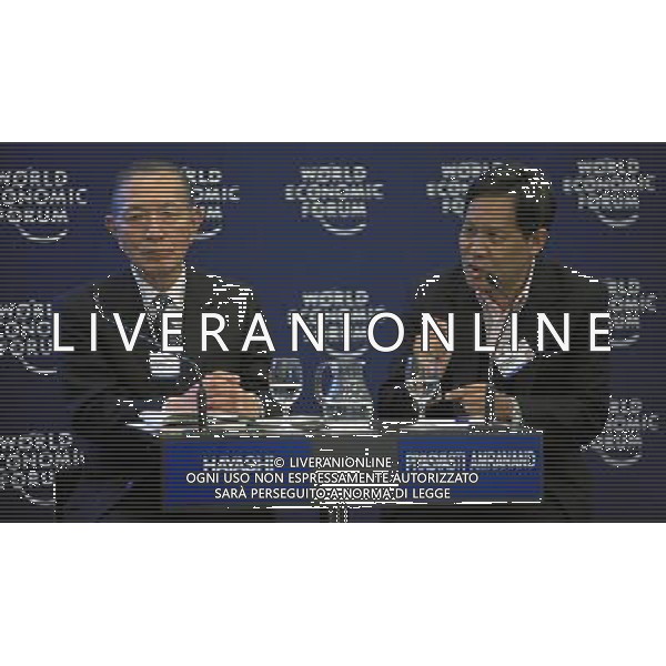 DAVOS/SWITZERLAND, 26JAN11 - Yasuo Hayashi (l.), Chairman and Chief Executive Officer, Japan External Trade Organization (JETRO), Japan and Piyasvasti Amranand, President, Thai Airways International, Thailand are captured during the session \'Insights on East Asia\' at the Annual Meeting 2011 of the World Economic Forum in Davos, Switzerland, January 26, 2011. World Economic Forum ©PHOTOSHOT/Agenzia Aldo Liverani Sas - ITALY ONLY - EDITORIAL USE ONLY -