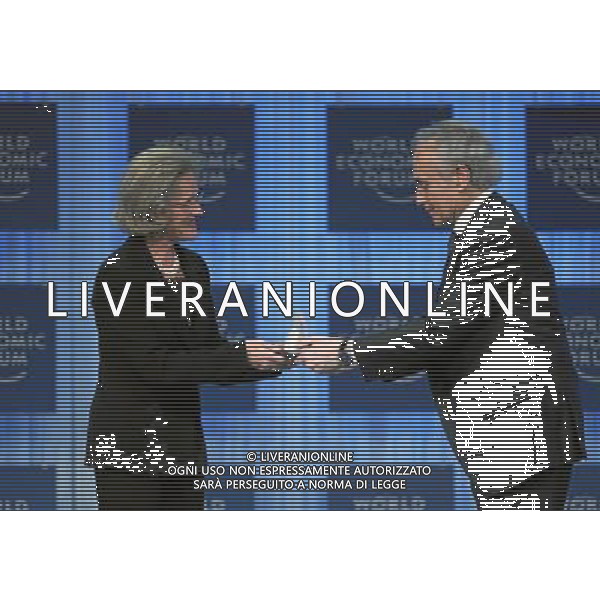 (110127) -- DAVOS, Jan. 27, 2011 () -- Chairperson of the Schwab Foundation for Social Entrepreneurship Hilde Schwab (L) presents the Crystal Award to Spanish tenor Jose Carreras at the World Economic Forum (WEF) in Davos, Switzerland, Jan. 26, 2011. The Crystal Award was firstly established in 1995 by the WEF for those outstanding musicians who made great contribution to the international community. (/World Economic Forum) (lyx) ©PHOTOSHOT/Agenzia Aldo Liverani Sas - ITALY ONLY - EDITORIAL USE ONLY -