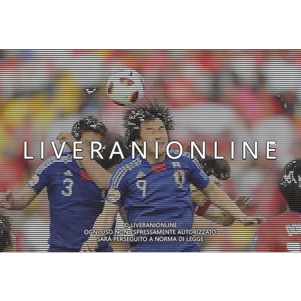 (110125) -- DOHA, Jan. 25, 2011 () -- Shinji Okazaki (front) of Japan heads the ball during the semifinal between Japan and South Korea at the Asian Cup in Doha, capital of Qatar, Jan. 25, 2011. (/Chen Shaojin)(lm) Doha , Coppa d\'Asia 2011 semifinali Giappone vs Corea del Sud AG. ALDO LIVERANI SAS ITALY ONLY