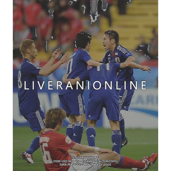 (110125) -- DOHA, Jan. 25, 2011 () -- Yuto Nagatomo (1st R) of Japan celebrates with his teammates for a goal during the semifinal between Japan and South Korea at the Asian Cup in Doha, capital of Qatar, Jan. 25, 2011. (/Chen Shaojin)(lm) Doha , Coppa d\'Asia 2011 semifinali Giappone vs Corea del Sud AG. ALDO LIVERANI SAS ITALY ONLY