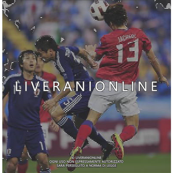 (110125) -- DOHA, Jan. 25, 2011 () -- Koo Ja Cheol (R) of South Korea heads the ball during the semifinal between Japan and South Korea at the Asian Cup in Doha, capital of Qatar, Jan. 25, 2011. (/Tao Xiyi)(lm) Doha , Coppa d\'Asia 2011 semifinali Giappone vs Corea del Sud AG. ALDO LIVERANI SAS ITALY ONLY