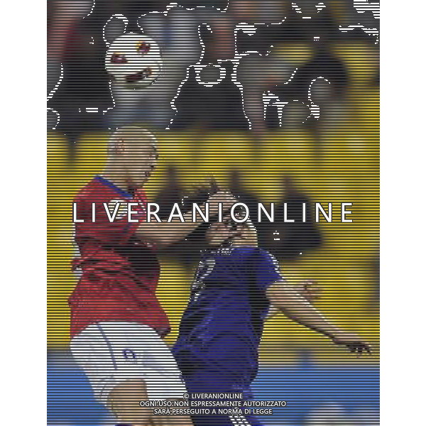 (110126) -- DOHA, Jan. 26, 2011 () -- Cha Du Ri (L) of South Korea heads the ball during the semifinal match between Japan and South Korea at the Asian Cup in Doha, capital of Qatar, Jan. 25, 2011. Japan defeated South Korea 3-0 on penalties after a 2-2 draw to reach the Asian Cup final. (/Tao Xiyi)(xm) Doha , Coppa d\'Asia 2011 semifinali Giappone vs Corea del Sud AG. ALDO LIVERANI SAS ITALY ONLY