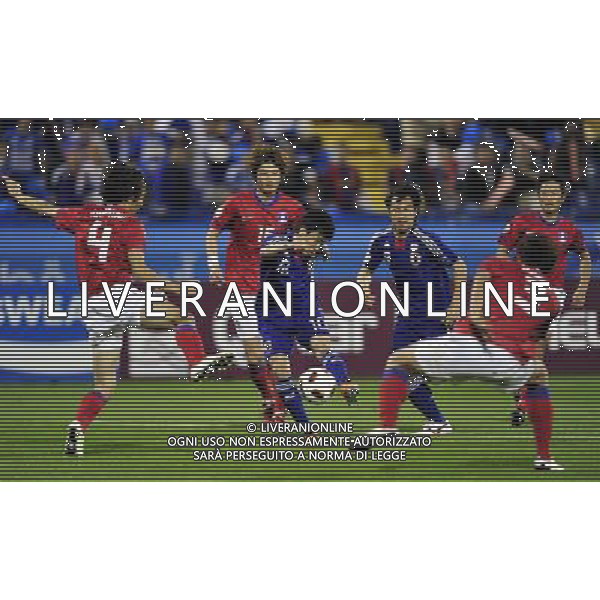 (110126) -- DOHA, Jan. 26, 2011 () -- Shinji Kagawa (C) of Japan shoots during the semifinal match between Japan and South Korea at the Asian Cup in Doha, capital of Qatar, Jan. 25, 2011. Japan defeated South Korea 3-0 on penalties after a 2-2 draw to reach the Asian Cup final. (/Tao Xiyi)(xm) Doha , Coppa d\'Asia 2011 semifinali Giappone vs Corea del Sud AG. ALDO LIVERANI SAS ITALY ONLY