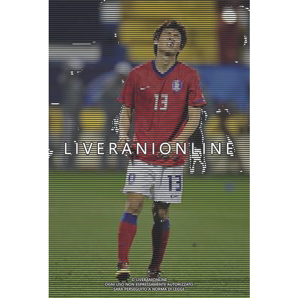 (110126) -- DOHA, Jan. 26, 2011 () -- Koo Ja Cheol of South Korea reacts for losing the penalty during the semifinal match between Japan and South Korea at the Asian Cup in Doha, capital of Qatar, Jan. 25, 2011. Japan defeated South Korea 3-0 on penalties after a 2-2 draw to reach the Asian Cup final. (/Tao Xiyi)(xm) Doha , Coppa d\'Asia 2011 semifinali Giappone vs Corea del Sud AG. ALDO LIVERANI SAS ITALY ONLY