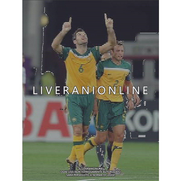 (110125) -- DOHA, Jan. 25, 2011 () -- Australia\'s Sasa Ognenovski (L) celebrates his goal during the Asian Cup semifinal between Uzbekistan and Australia in Doha, capital of Qatar, Jan. 25, 2011. Australia won 6-0 and advanced to the final. (/Chen Shaojin) (zw) Doha Coppa d\'Asia 2011 Uzbekistan vs Australia AG. ALDO LIVERANI SAS ITALY ONLY
