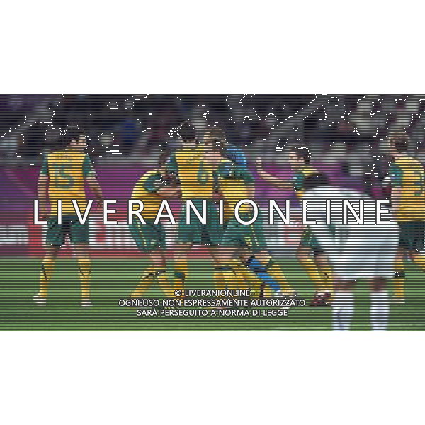 (110126) -- DOHA, Jan. 26, 2011 (Xinhua) -- Players of Australia celebrate the goal during the Asian Cup semifinal match between Uzbekistan and Australia in Doha, capital of Qatar, Jan. 25, 2011. Australia won 6-0 and advanced to the final. (Xinhua/Chen Shaojin) (xm) Doha Coppa d\'Asia 2011 Uzbekistan vs Australia AG. ALDO LIVERANI SAS ITALY ONLY