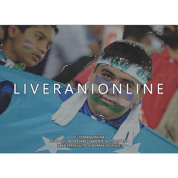 (110126) -- DOHA, Jan. 26, 2011 (Xinhua) -- A supporter of Uzbekistan team cheers during the Asian Cup semifinal match between Uzbekistan and Australia in Doha, capital of Qatar, Jan. 25, 2011. Australia won 6-0 and advanced to the final. (Xinhua/Chen Shaojin) (xm) Doha Coppa d\'Asia 2011 Uzbekistan vs Australia AG. ALDO LIVERANI SAS ITALY ONLY