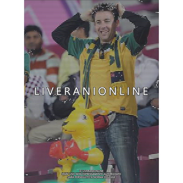 (110126) -- DOHA, Jan. 26, 2011 () -- A supporter of Australia team cheers during the Asian Cup semifinal match between Uzbekistan and Australia in Doha, capital of Qatar, Jan. 25, 2011. Australia won 6-0 and advanced to the final. (/Chen Shaojin) (xm) Doha Coppa d\'Asia 2011 Uzbekistan vs Australia AG. ALDO LIVERANI SAS ITALY ONLY