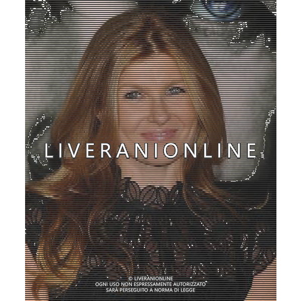 Connie Britton Photo by Gilbert Flores \'The Rite\' World Premiere at the Grauman\'s Chinese Theatre January 26, 2011 - Hollywood, California AG. ALDO LIVERANI SAS ITALY ONLY *** Local Caption ***
