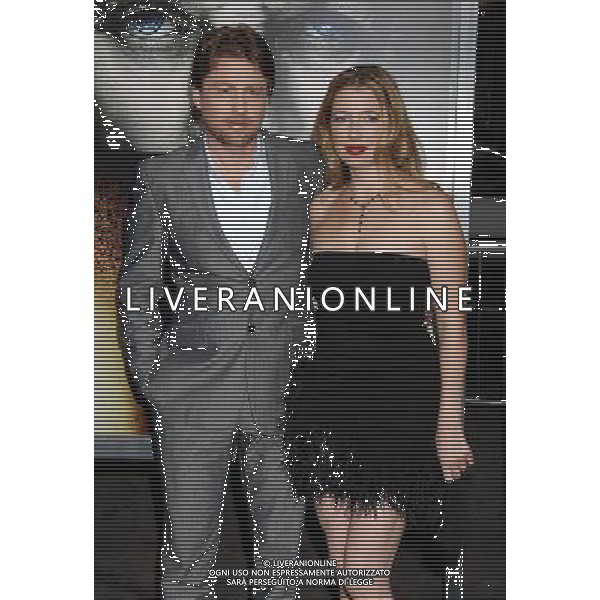 Mikael Hafstrom and wife Kelly Photo by Janet Gough \'The Rite\' World Premiere at Grauman\'s Chinese Theatre January 26, 2011 - Hollywood, California AG. ALDO LIVERANI SAS ITALY ONLY *** Local Caption ***