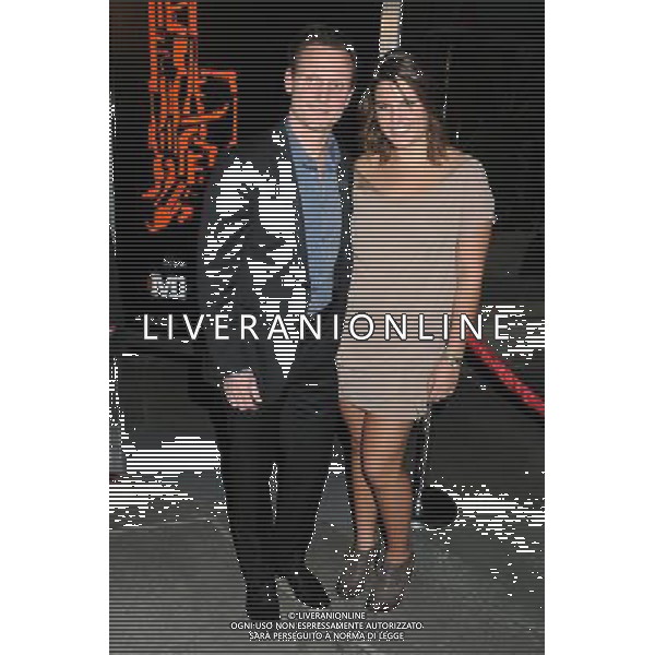 25 January 2011 - Hollywood, California - Tony Goldwyn and guest. \'The Mechanic\' Los Angeles Premiere held at Arclight Cinemas. Photo Credit: Byron Purvis/AdMedia AG. ALDO LIVERANI SAS ITALY ONLY