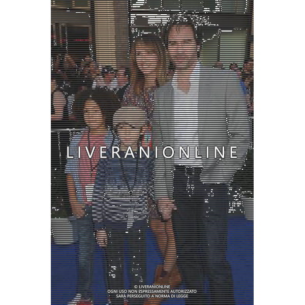 23 January 2011 - Hollywood, California - Eric McCormack and family. \'Gnomeo and Juliet\' World Premiere held at the El Capitan Theatre. Photo Credit: Byron Purvis/AdMedia AG. ALDO LIVERANI SAS ITALY ONLY