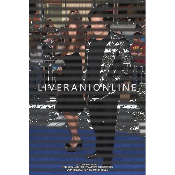 23 January 2011 - Hollywood, California - David Copperfield and guest. \'Gnomeo and Juliet\' World Premiere held at the El Capitan Theatre. Photo Credit: Byron Purvis/AdMedia AG. ALDO LIVERANI SAS ITALY ONLY