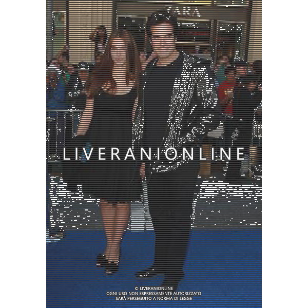 23 January 2011 - Hollywood, CA - David Copperfield (R) and guest. Gnomeo And Juliette World Premiere held At The El Capitan Theatre. Photo Credit: Kevan Brooks/AdMedia AG. ALDO LIVERANI SAS ITALY ONLY