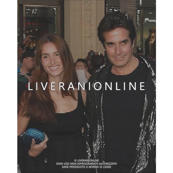 23 January 2011 - Hollywood, CA - David Copperfield (R) and guest. Gnomeo And Juliette World Premiere held At The El Capitan Theatre. Photo Credit: Kevan Brooks/AdMedia AG. ALDO LIVERANI SAS ITALY ONLY