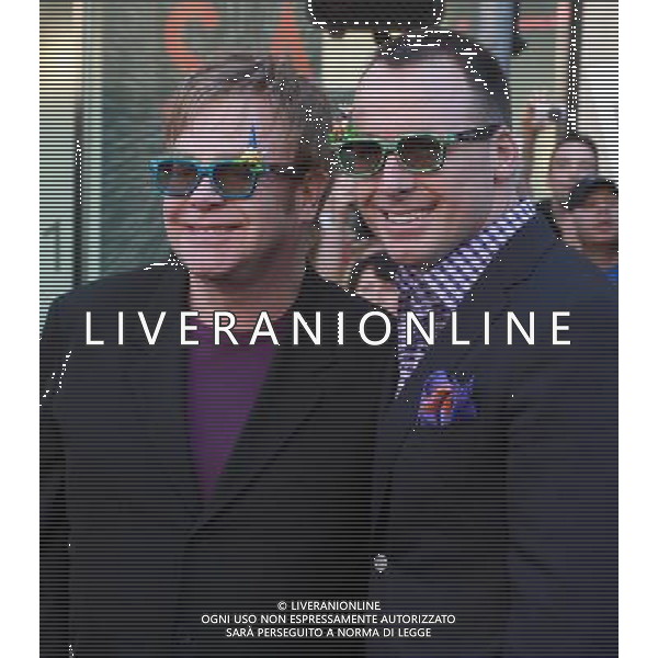 23 January 2011 - Hollywood, CA - Elton John and David Furnish. Gnomeo And Juliette World Premiere held At The El Capitan Theatre. Photo Credit: Kevan Brooks/AdMedia AG. ALDO LIVERANI SAS ITALY ONLY